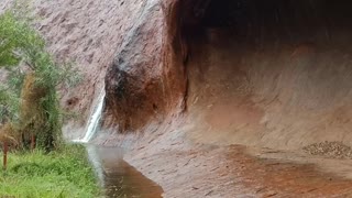 Stunning Desert Rains Roll Off Uluru