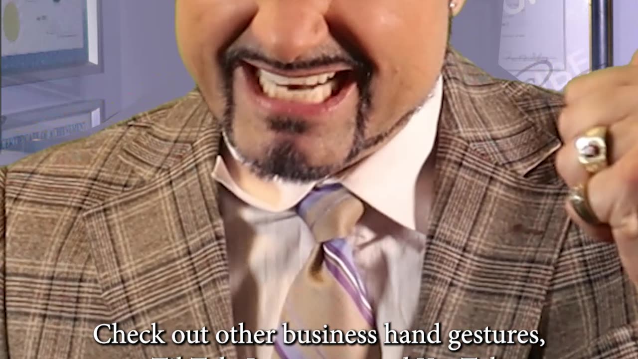 Business Hand Gestures! This one means "The handgun steeple"