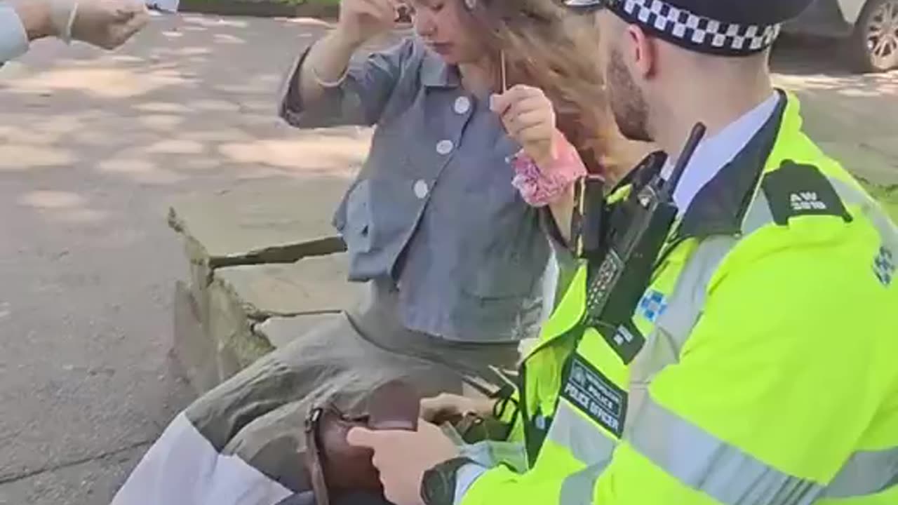 British police arresting a right wing child