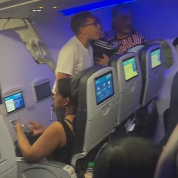 Screaming match breaks out on flight between man and mother with kids
