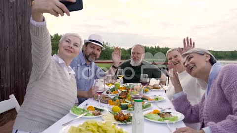 A Group Of Senior Friends Taking Selfies 1