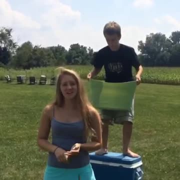 Boy Tries To Dump Ice Water Over Sister’s Head But It Backfires