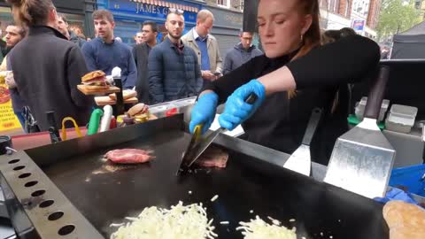 Who wouldn't like such a cheerful, hardworking and beautiful street food shop owner?