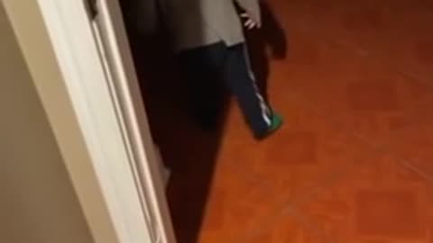 Kid discovers his shadow and is absolutely terrified of it!