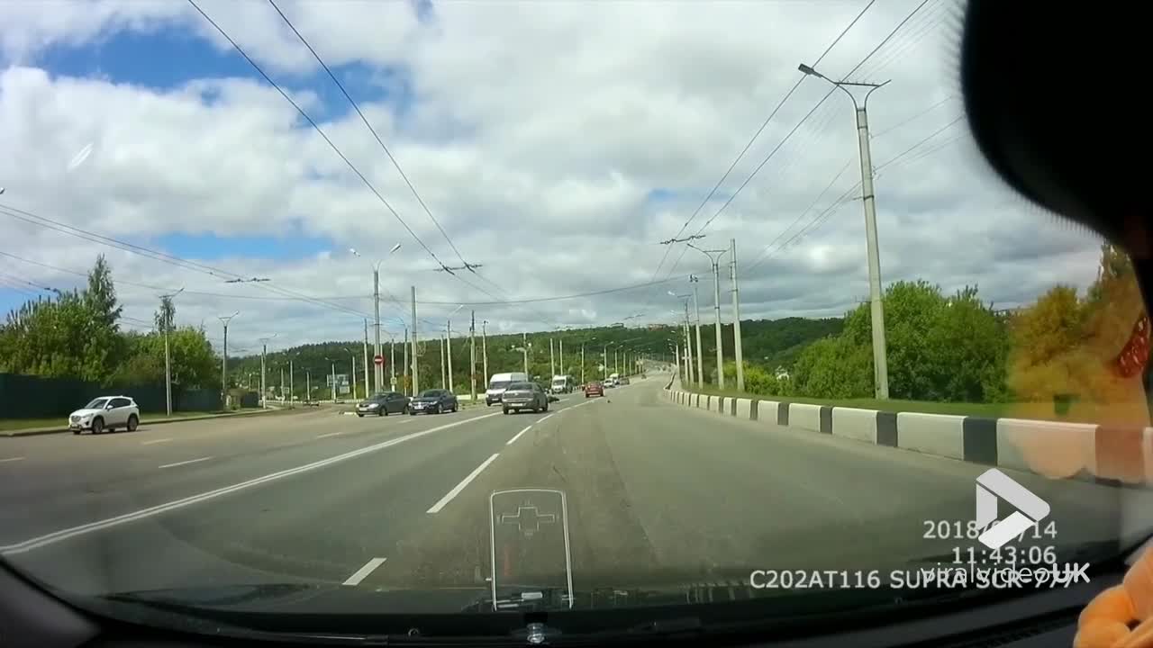 Motorcyclist looses control on busy freeway