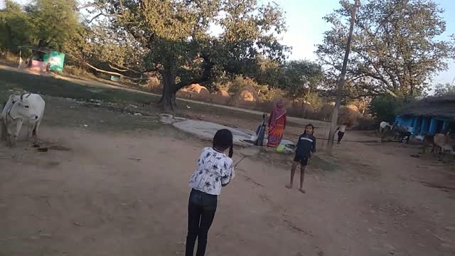 Two Girl playing badminton I village life