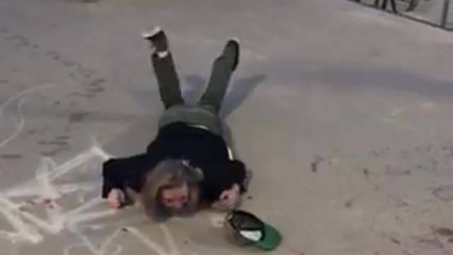 Skateboarder tries trick while drinking beer and falls hard