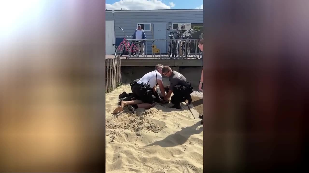 Cops choke-slam surfer to ground and arrest him for not displaying beach badge