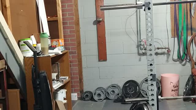 90 lb attached dead hang pull up for one rep