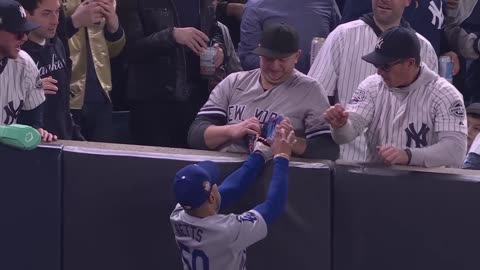 Yankees fan pulls ball out of Mookie Betts' glove in World Series Game 4 |