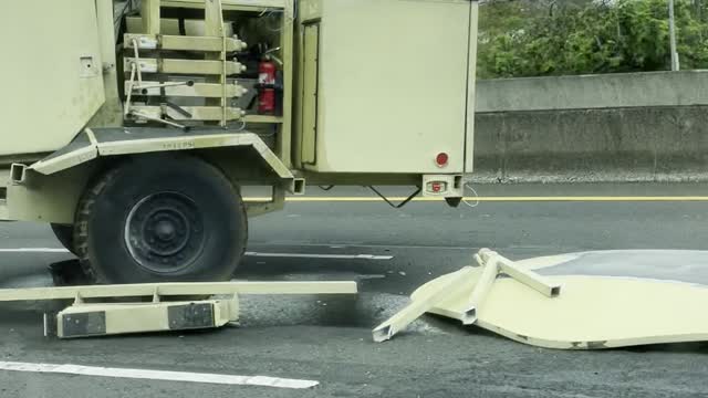 Military Hummer Jackknifes on Highway