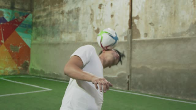 Soccer freestyler doing skillful tricks with the ball