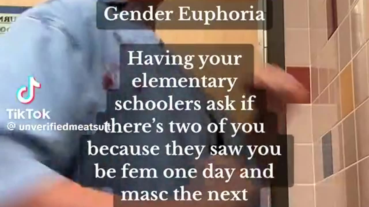 Green-haired non-binary school teacher celebrates on confusing students about her gender..