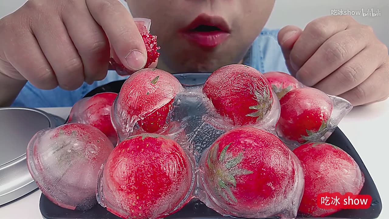 Eat a small half-orb of strawberry Thin Crunch ice and listen to the crunch with the drink!