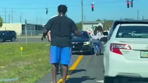 Woman Pulls Gun in Road Rage