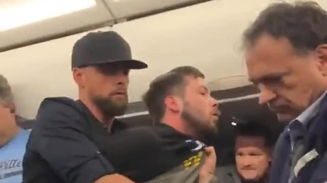 Man tries to open door mid-flight.