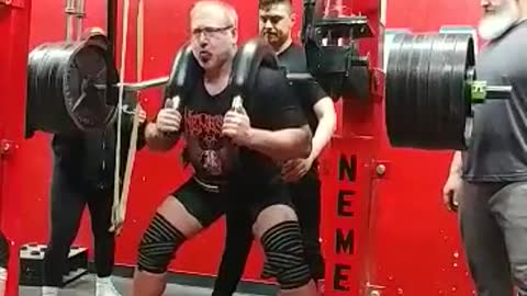 705 lb Marrs bar squat