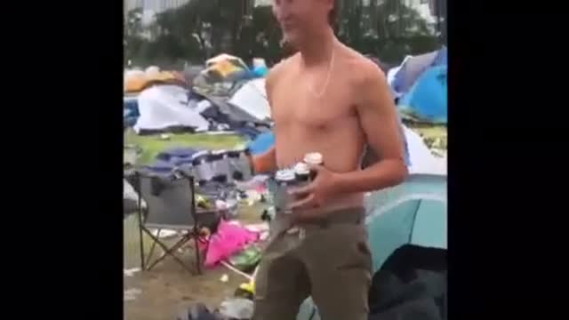 Guys come out of tents and slam beers
