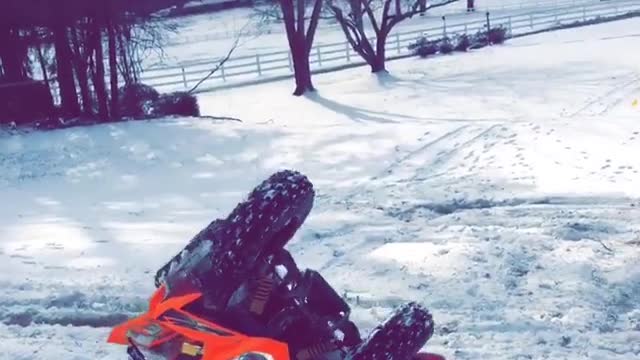Collab copyright protection - red atv flips over with man