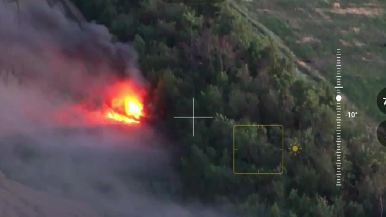 Russian Tank Engulfed in Flames After Drone Strike