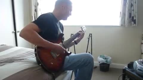 martin dennis playing guitar