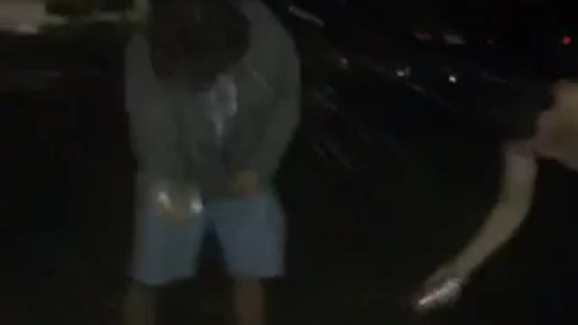 Guys smashing beer can on head