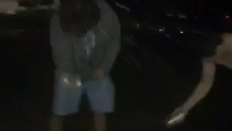 Guys smashing beer can on head