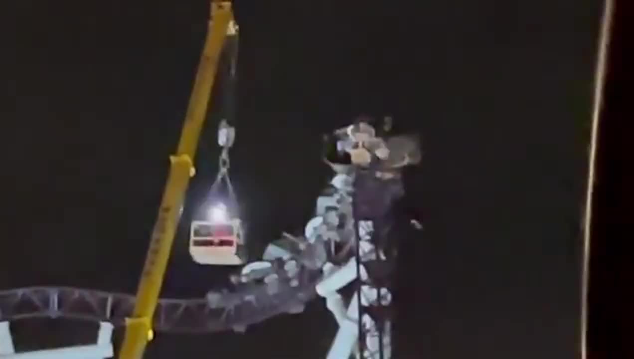 Nine people stuck on a carousel over 30 meters high
