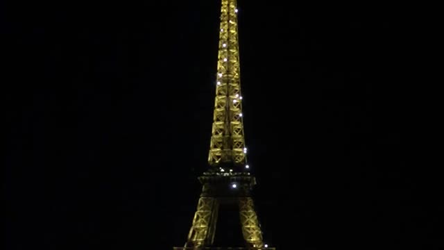 Eiffel Tower in a beautiful night with a romantic music
