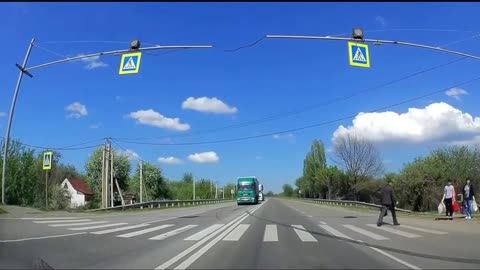 Truck almost hits an old man crossig the street!