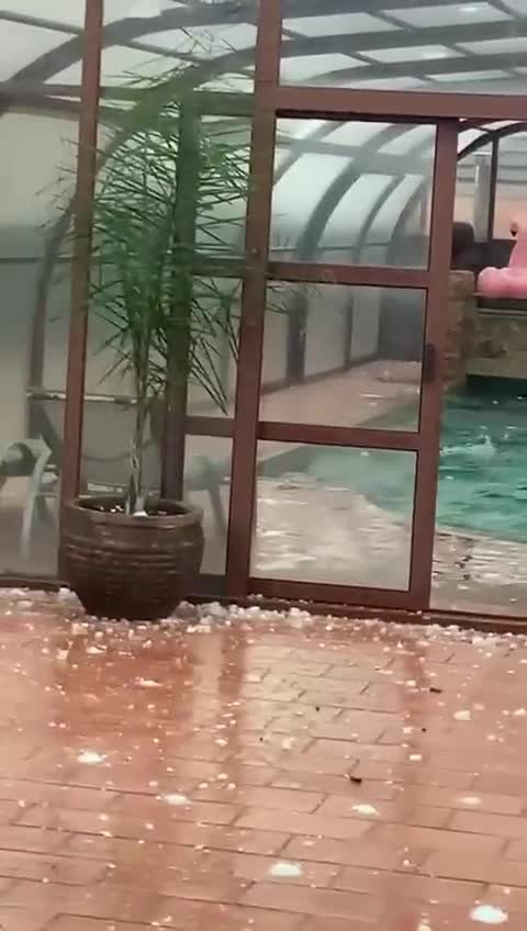 Hail Damages Covered Pool