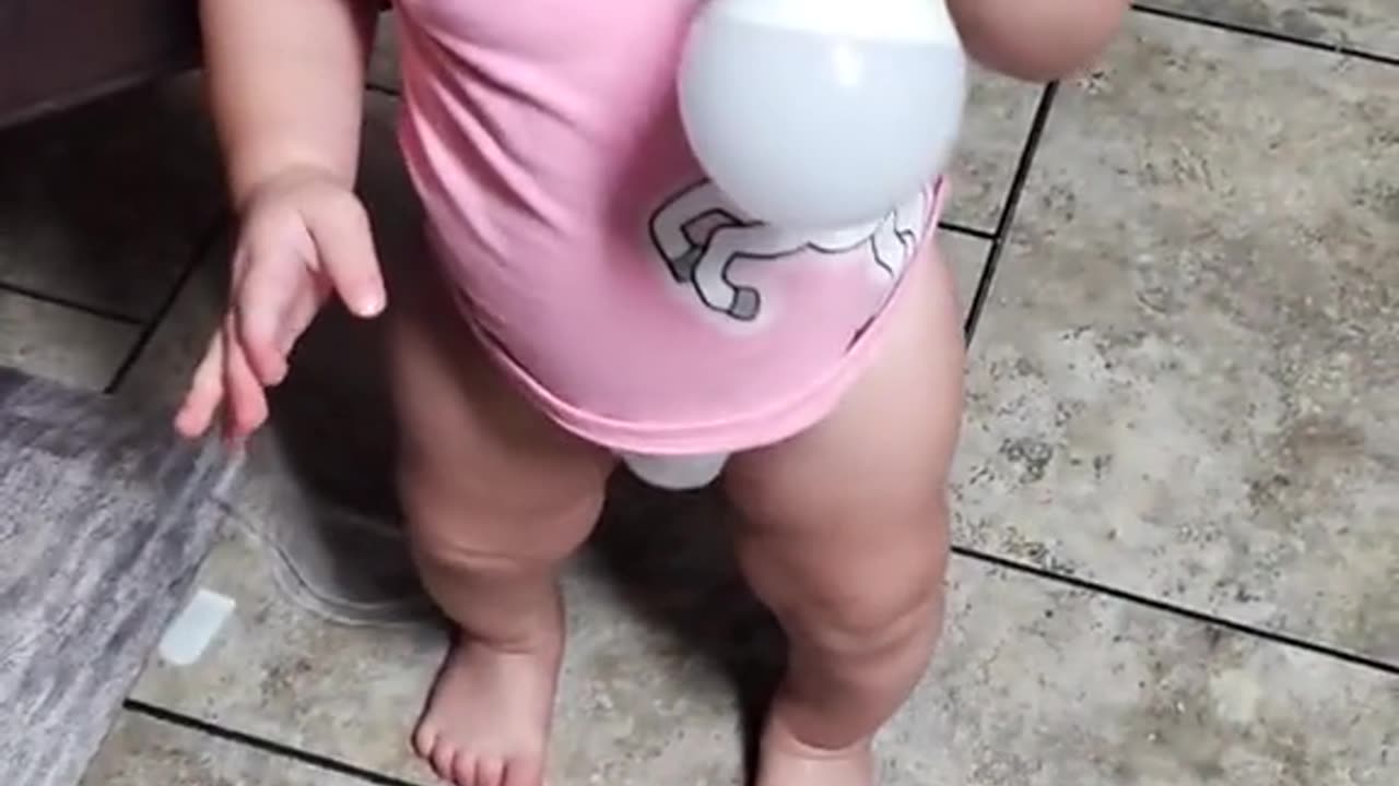 Baby lights up lightbulb