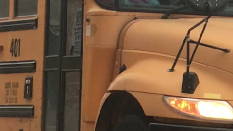 Woman Smoking on School Bus