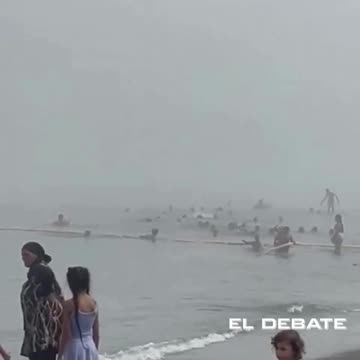 Hundreds of illegal migrants swimming to the Spanish enclave Ceuta from Morocco