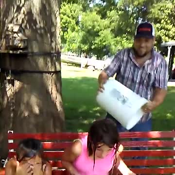 Dad Wakes Up Daughters With Ice Cold Bucket Of Water