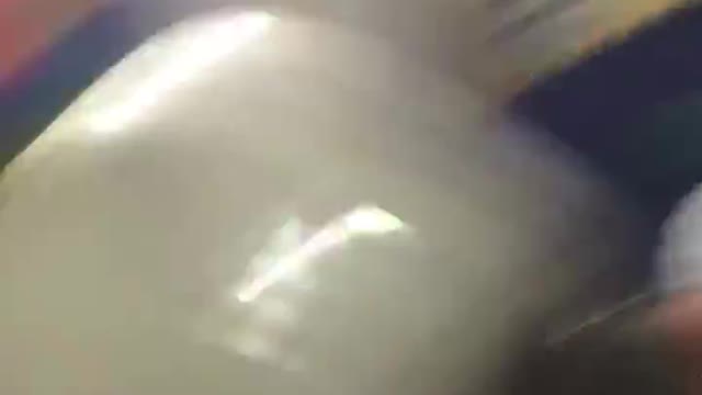 Guy with condom on his head runs into wall and pops it