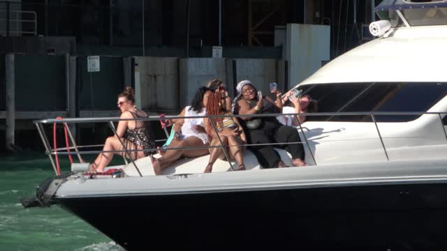 FEMALES OF ALL COLORS ON BOATS AND YACHTS HAVING FUN !!!! Alexjones Tate Trump Infowars