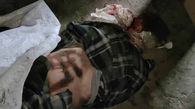 A megkínzott ukrán nő holtestén belevágott horogkereszt