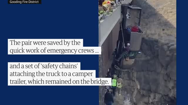 Two rescued from truck dangling over Idaho bridge