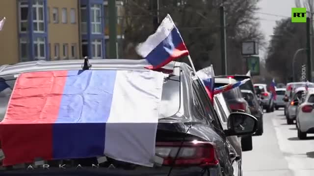 Participants decorated their cars with signs saying, ‘Stop hating Russians.’