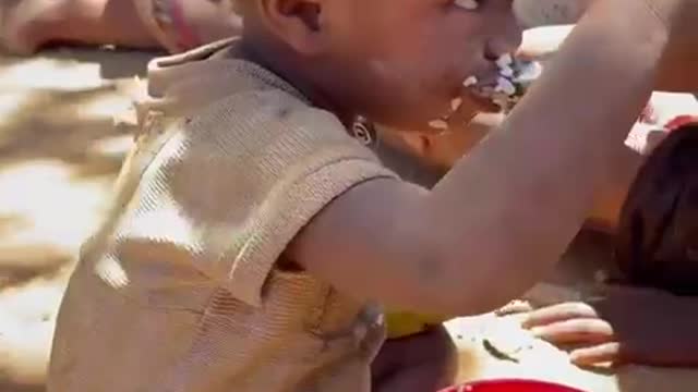 Cute babies. Sharing food