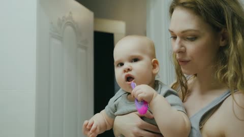 Smiles All Around: Mom and Baby's Toothbrush Time Adventure