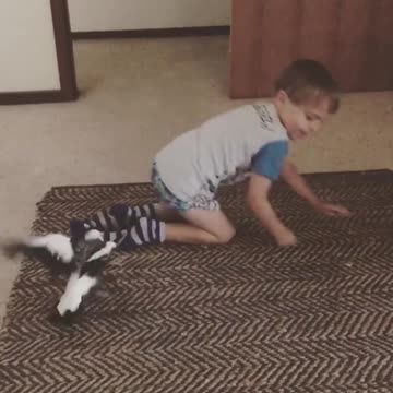 Baby Boy Plays With Birdy Catch The Socks