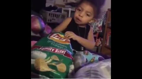 So funny to watch this kid eat her chips