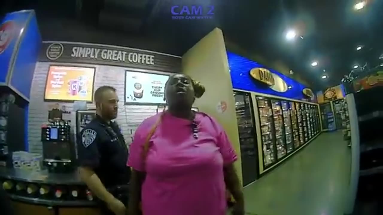 "2 Cops Can't Take Down 1." Woman Wrestles with Police during Chaotic Warrant Arrest