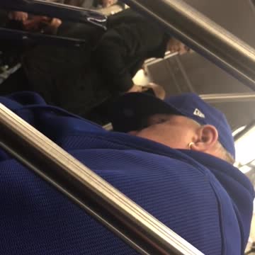 Man sleeps on subway train and hits his head on handrail