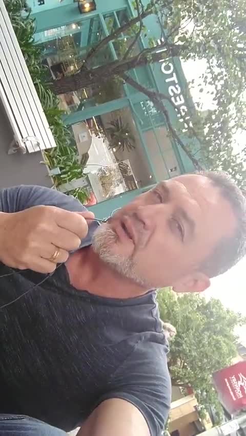 Ex cop in Sydney segregated from society to eat breakfast outside in the rain