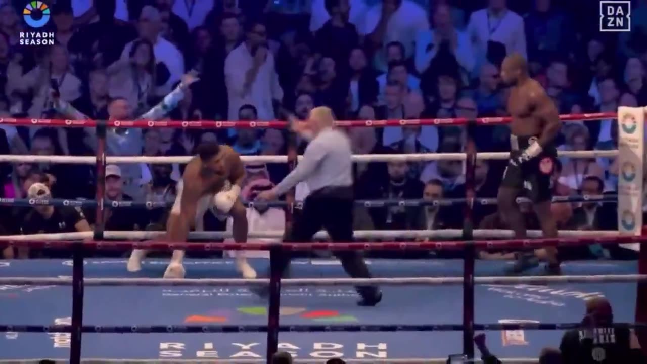 DUBOIS KNOCKS JOSHUA DOWN