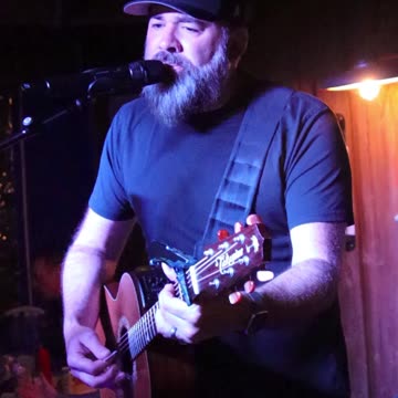 rad Emanuel sings Morgan Wallen's song Cover Me Up at Clear Water Harbor