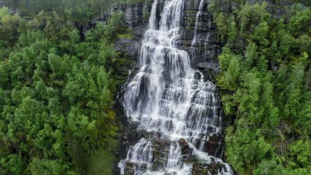 aerial footage from tvindefossen waterfall from the birds eye view norway